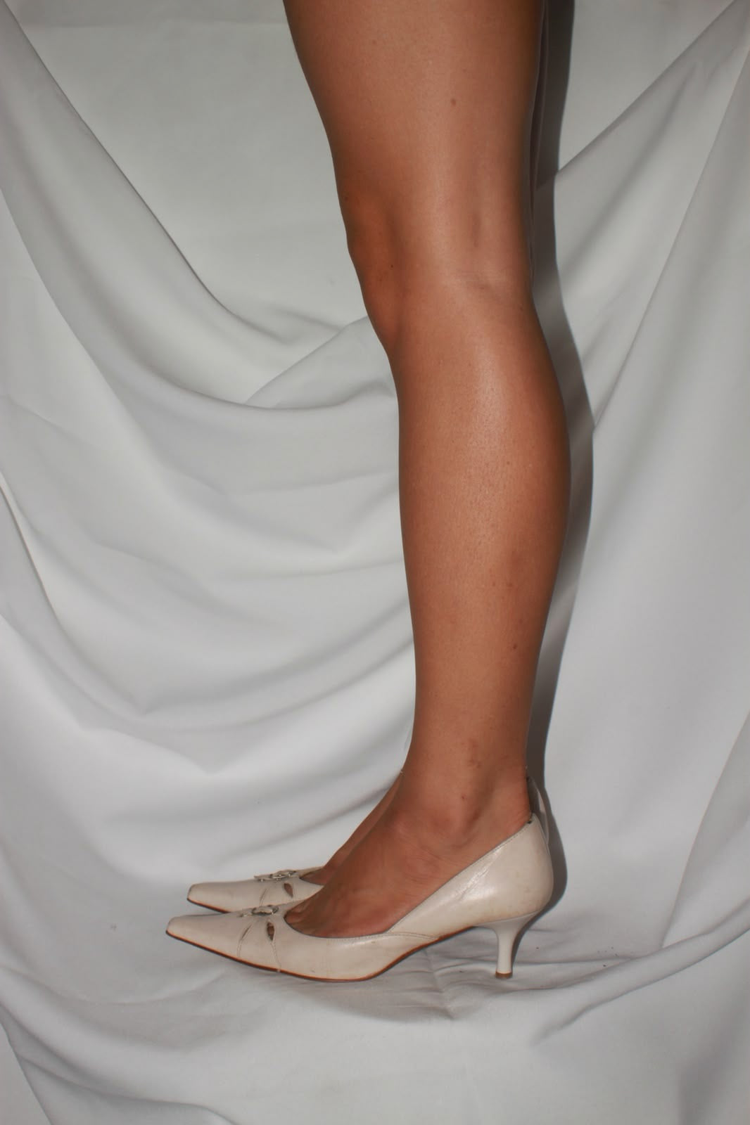 White leather kitten heels by Straboski