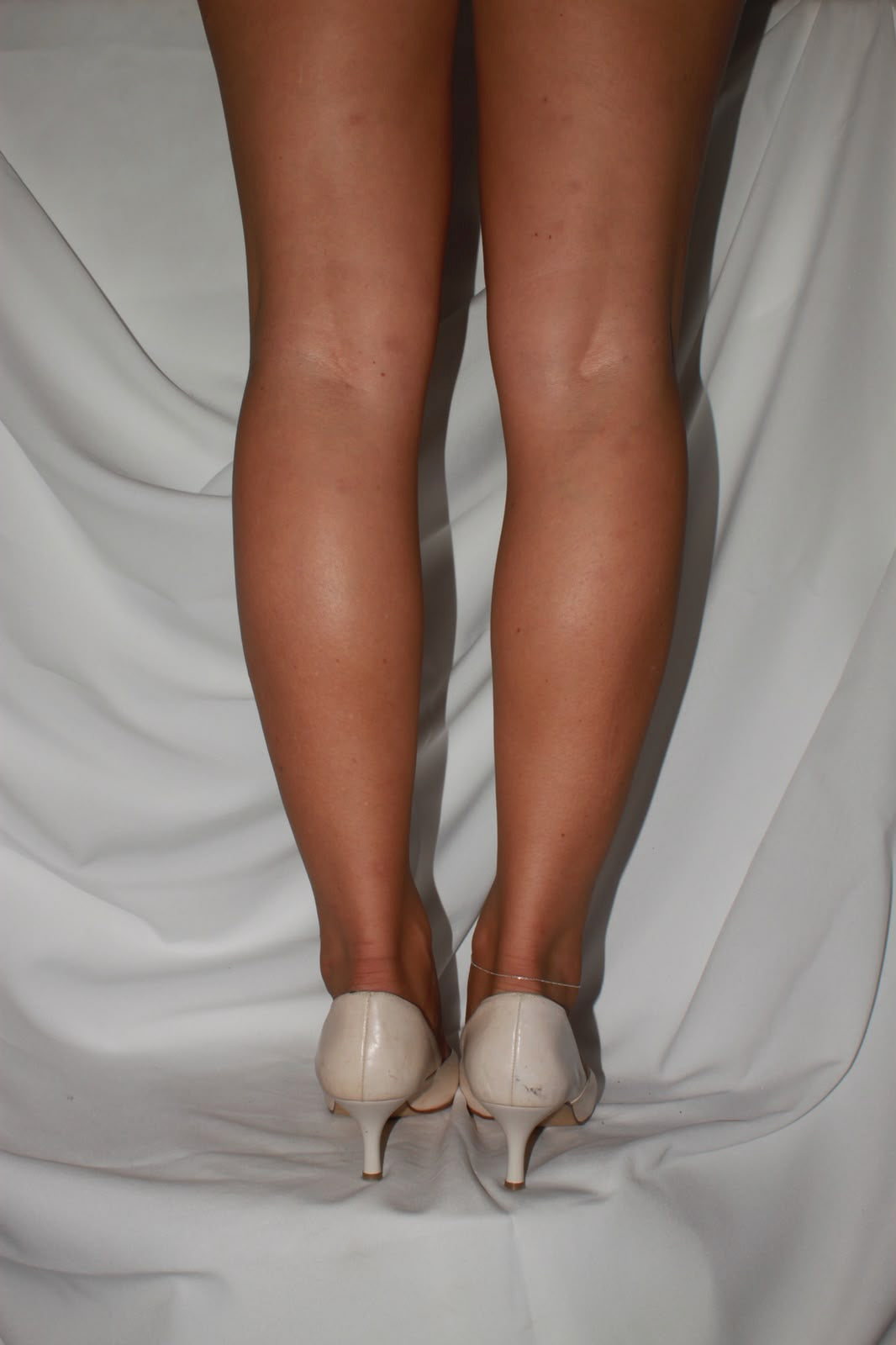 White leather kitten heels by Straboski