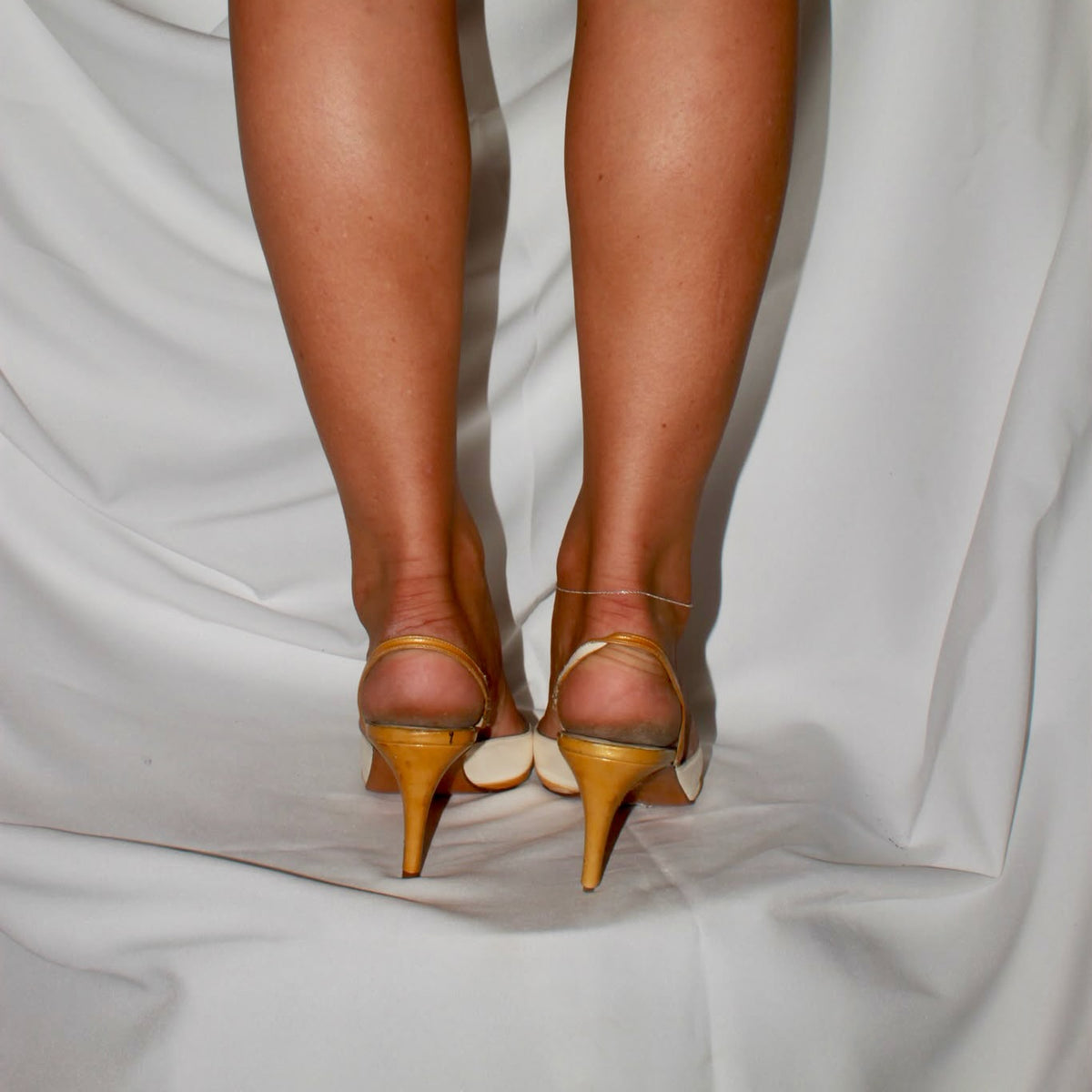 Gold and white heels