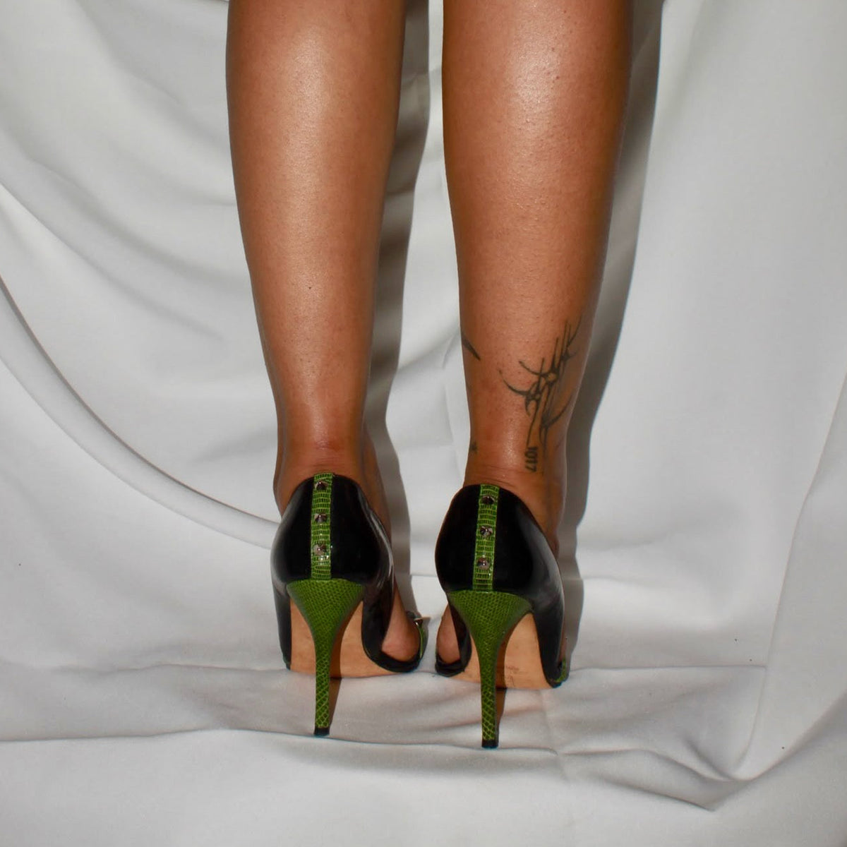 Green spike heels