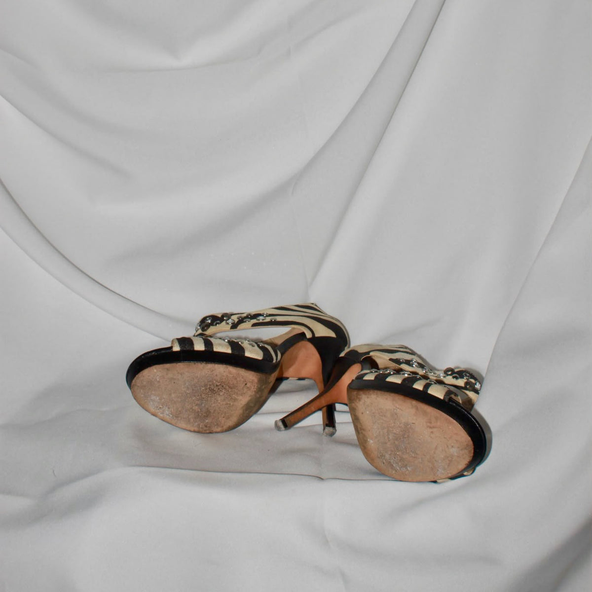 Zebra grommet heels